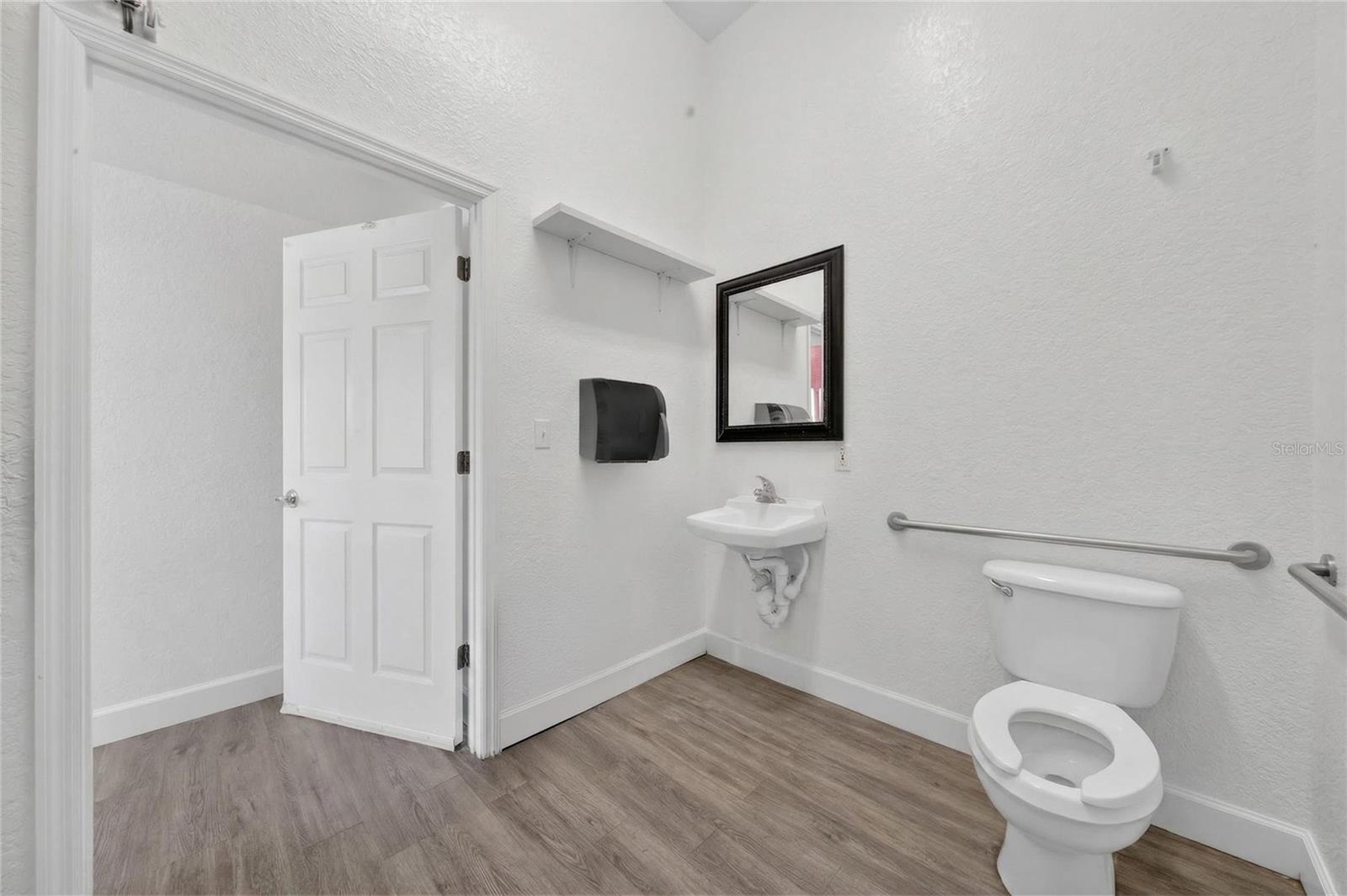 Restroom with view of exit door.
