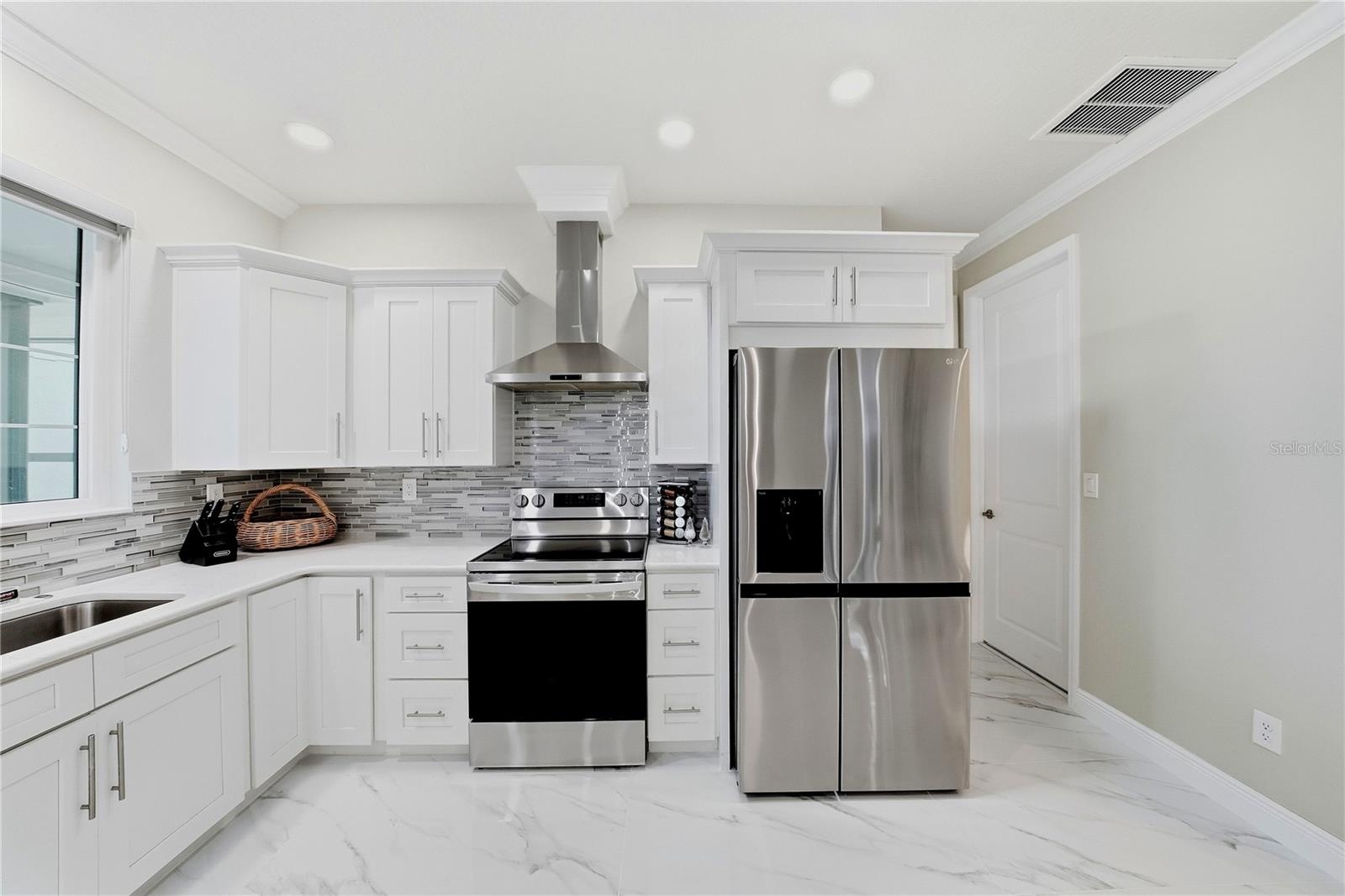 Kitchen with stainless steel appliances