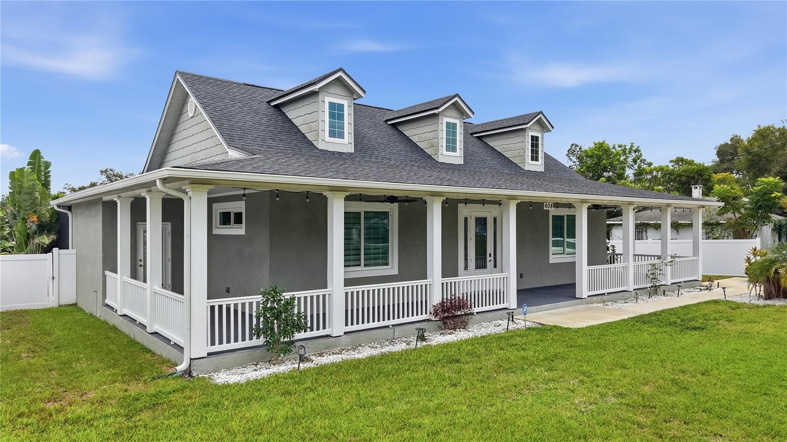 Front of home with 1,100 sq ft wrap around porch