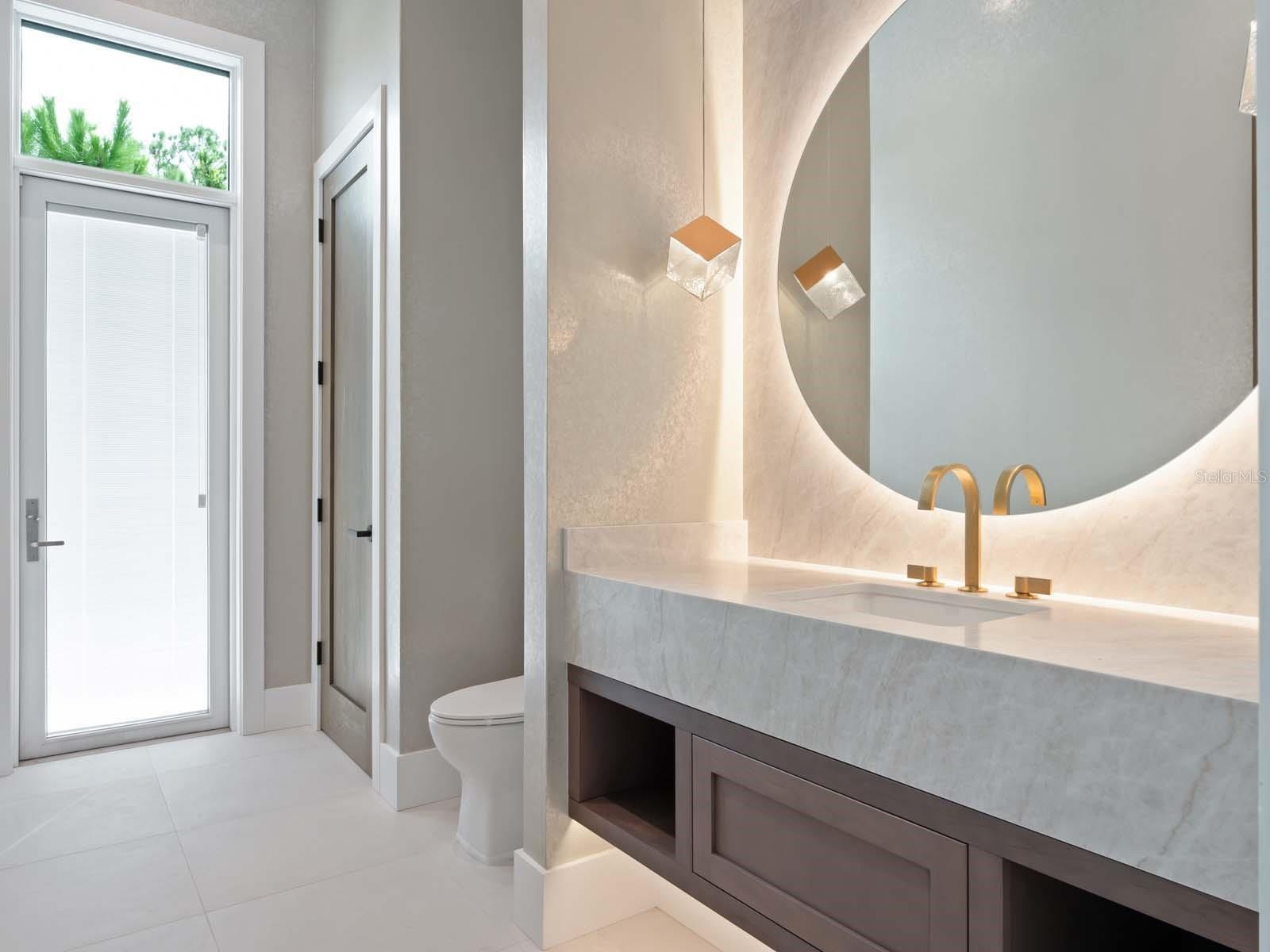 Downstairs Half Bath with Pool Access
