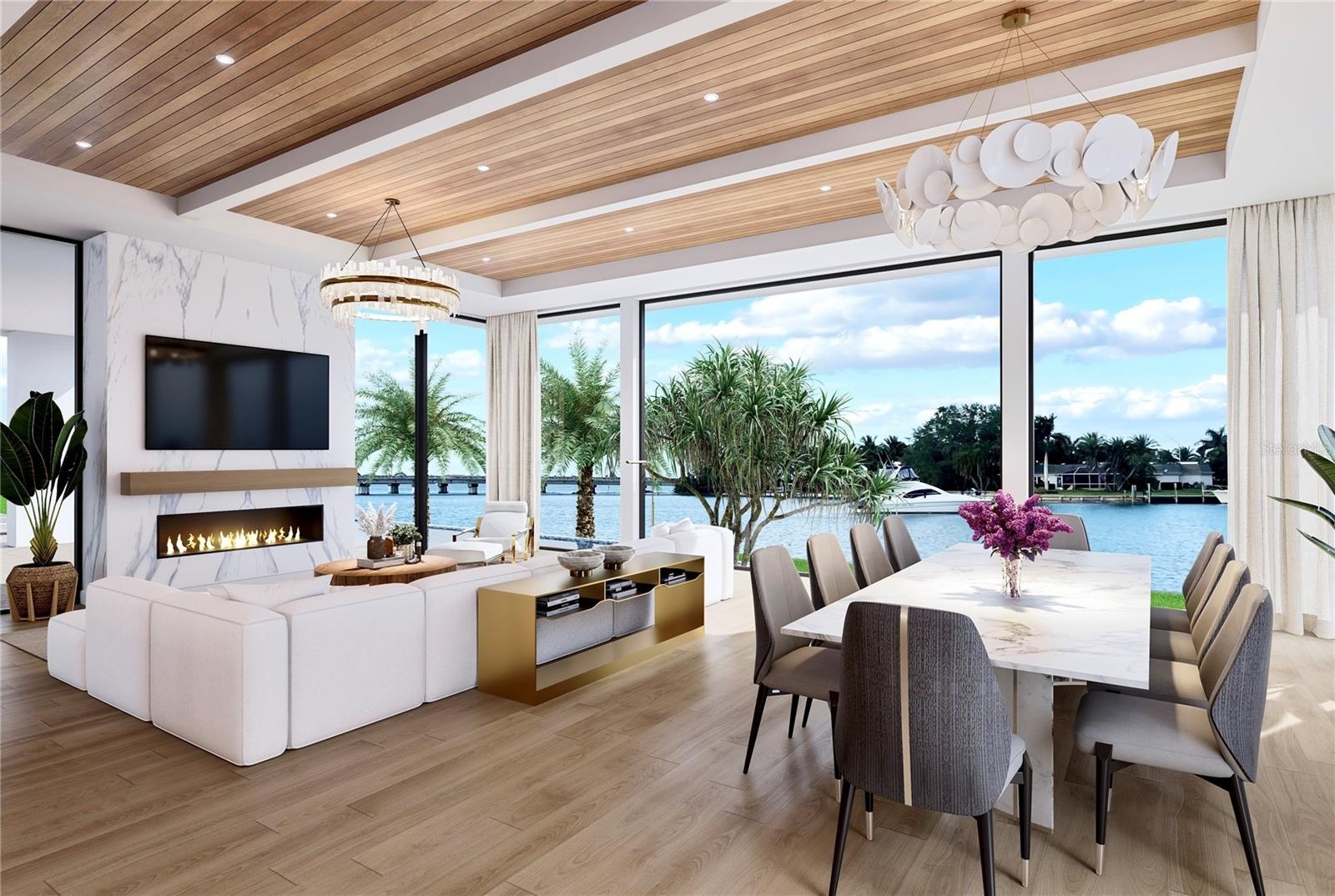 The open concept design emphasizes natural light and a seamless indoor-outdoor connection. The electric fireplace adds a cozy element. The 11 foot  fl