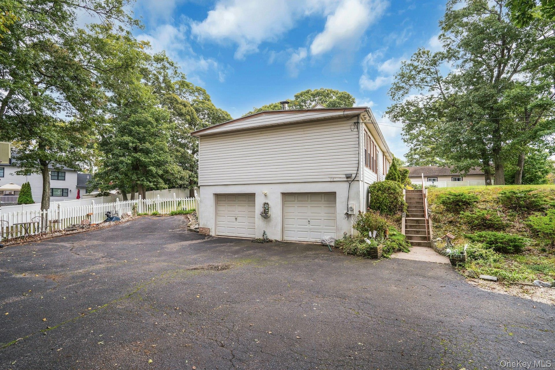 Private Driveway, Two car garage and plenty of parking.