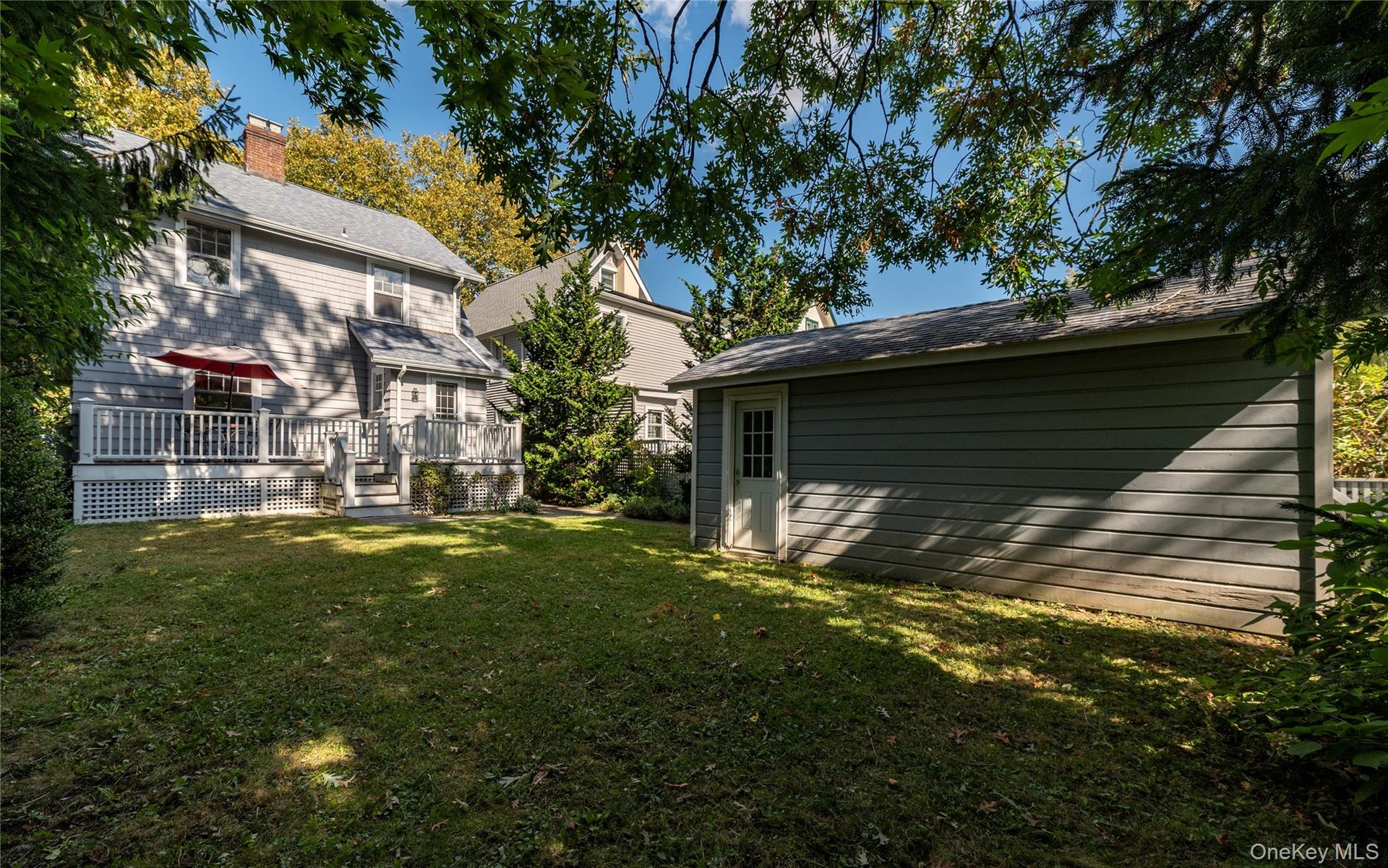 yard with house and garage