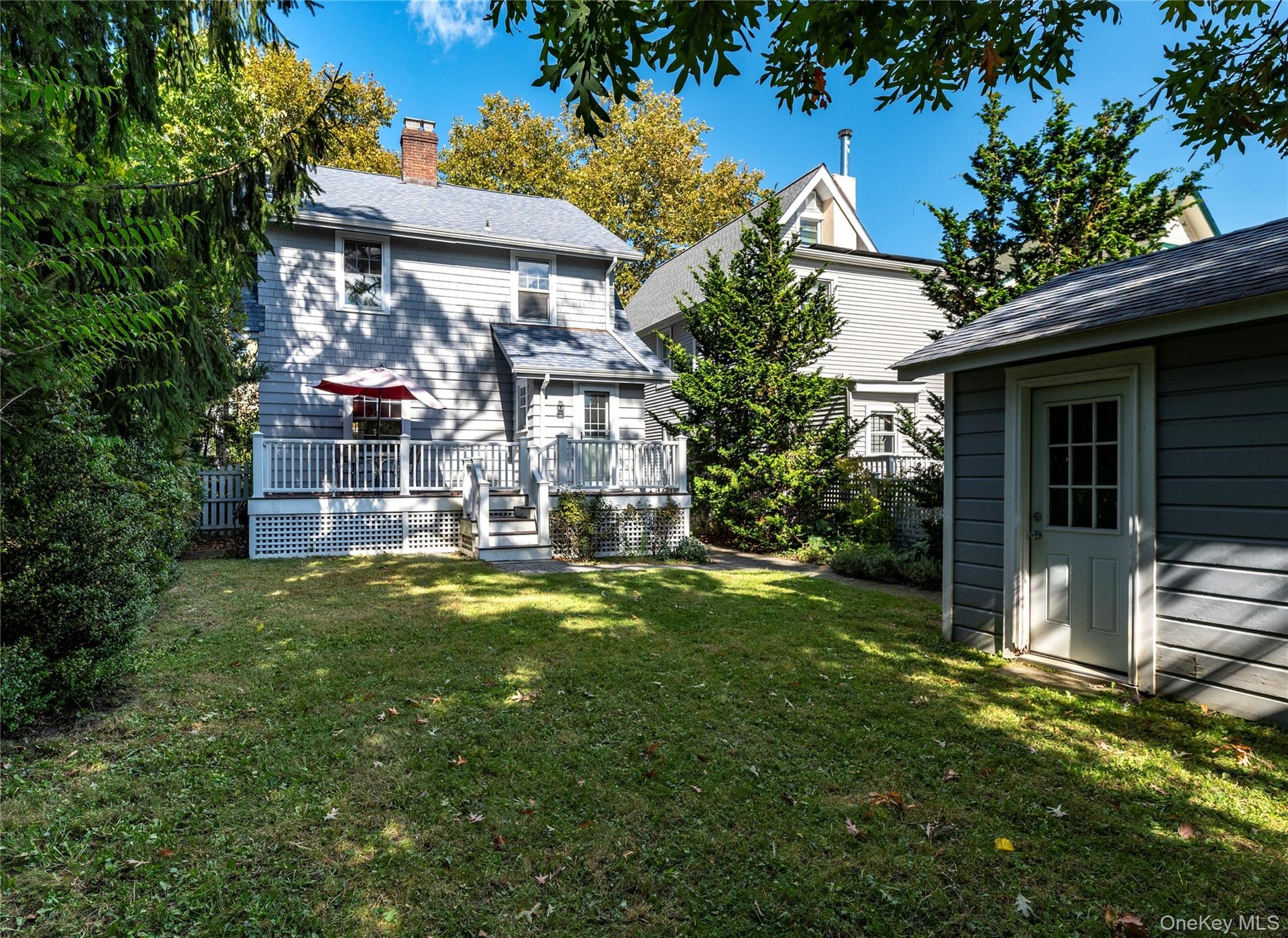 Private back yard with detached garage