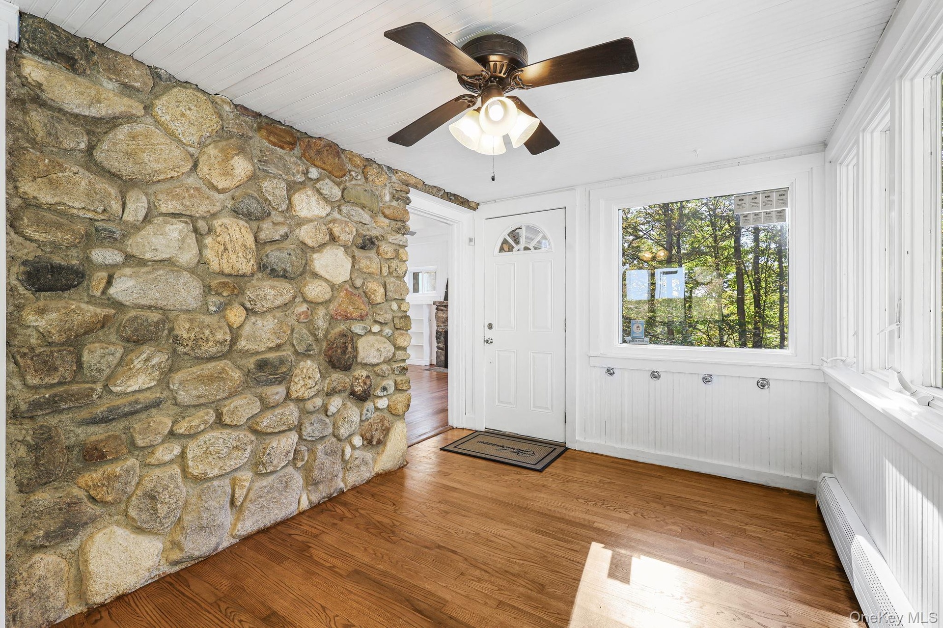 From Main Entrance directly Into the sun room