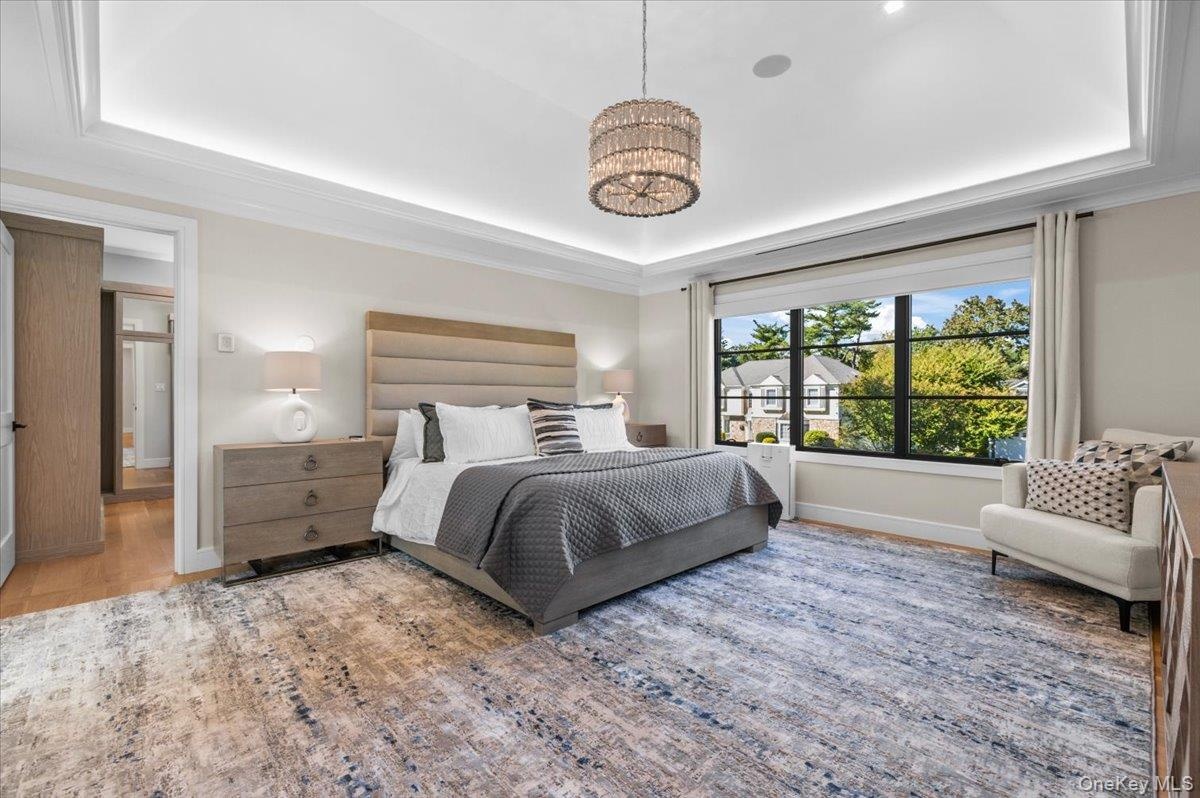 Tray ceiling with cove lighting and crown molding