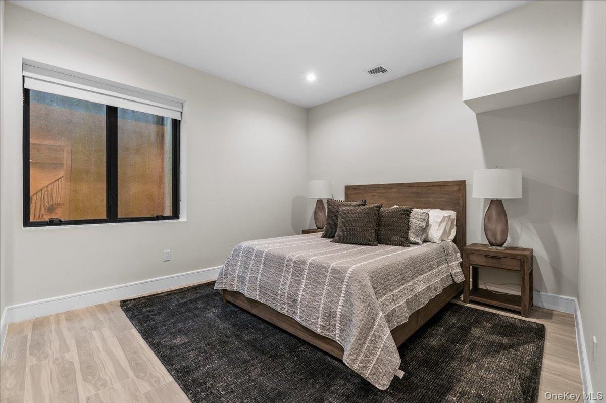 Recessed lighting illuminates the room,