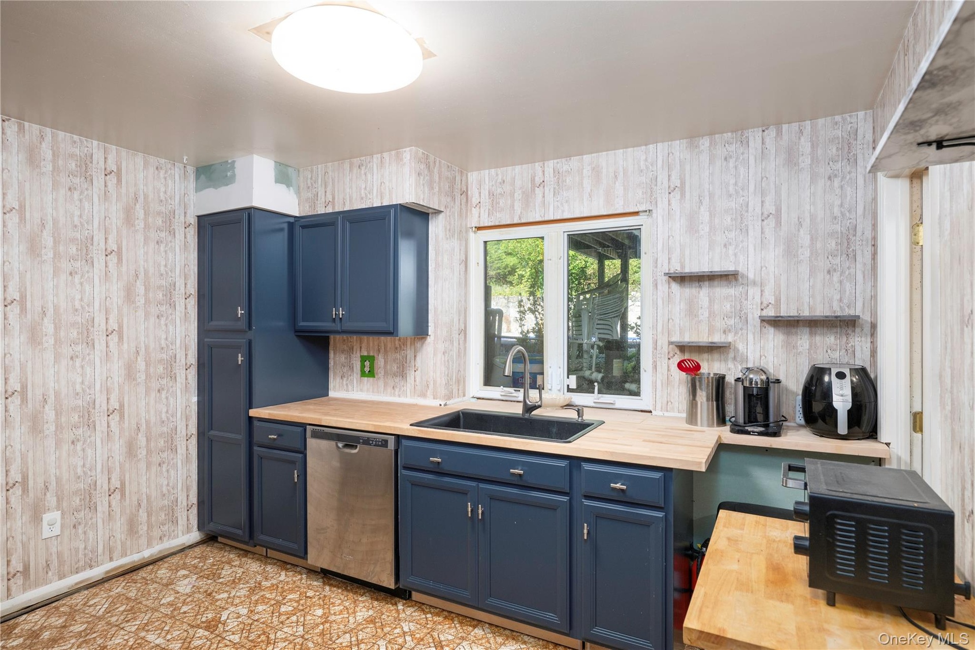 Summer Kitchen on lower level.