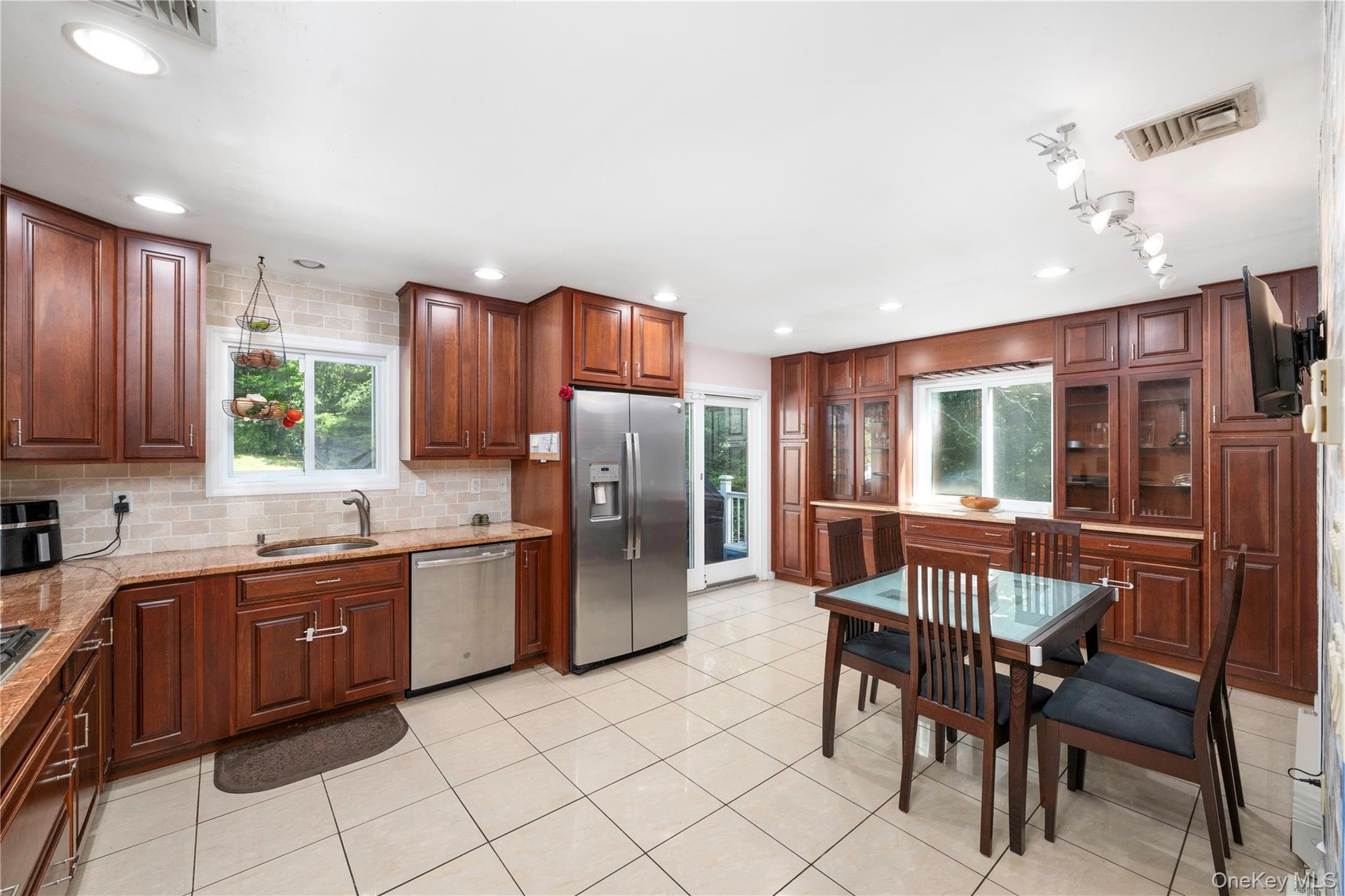 Kitchen with sliders walk out to the back deck.