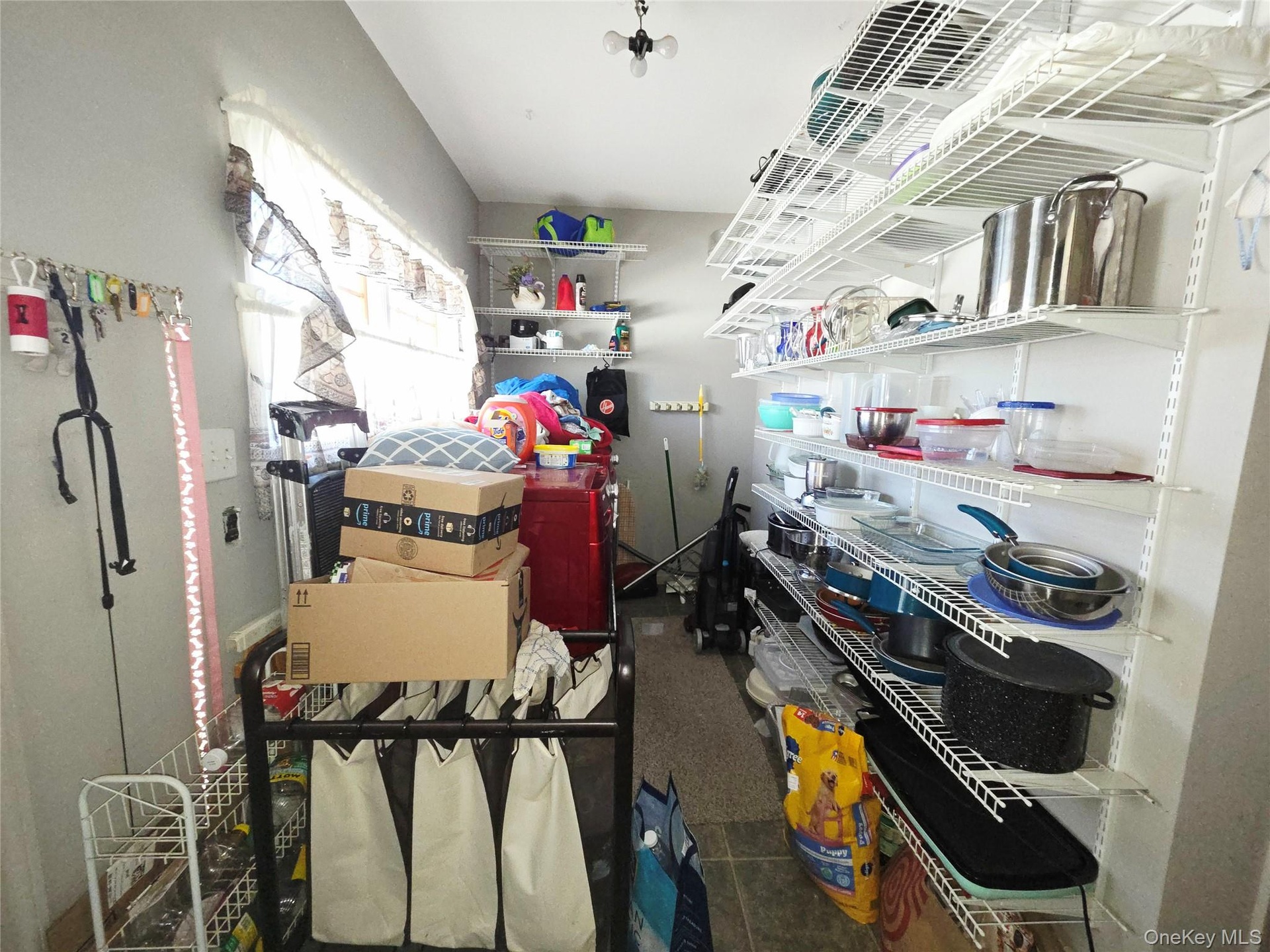 Laundry and storage behind the kitchen