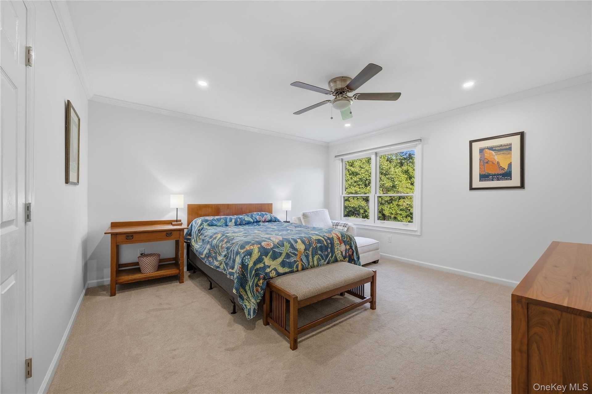 Primary Bedroom Suite with recessed lights, ceiling fan, huge walk-in closet with attic scuttle access