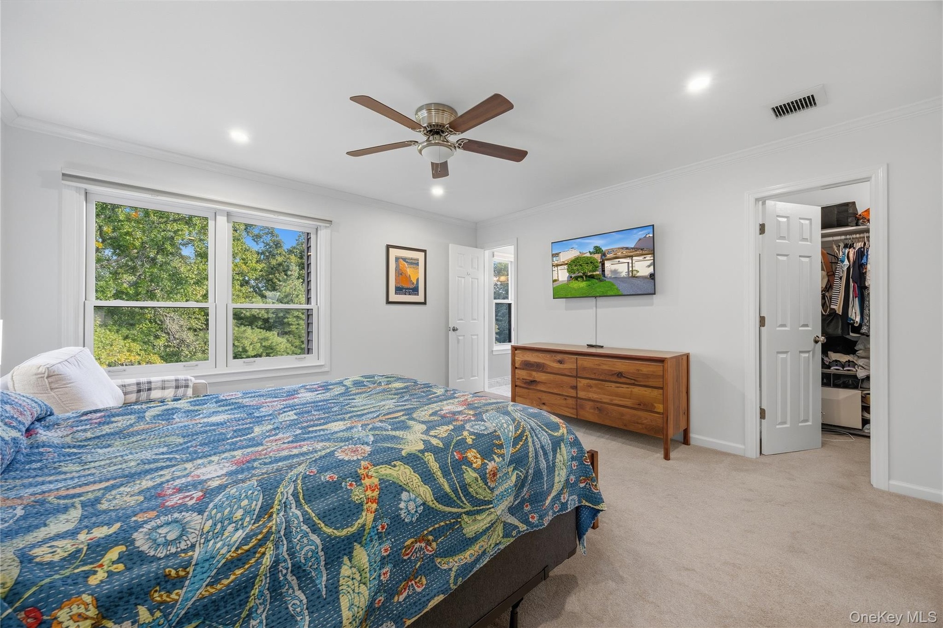 View of closet and bathroom