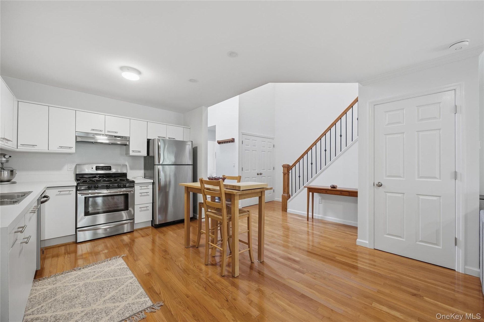Additional view of updated Kitchen with the door to the Basement.