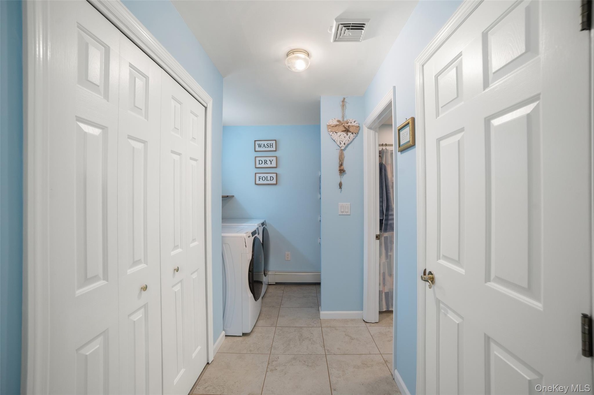 Primary Bedroom with laundry
