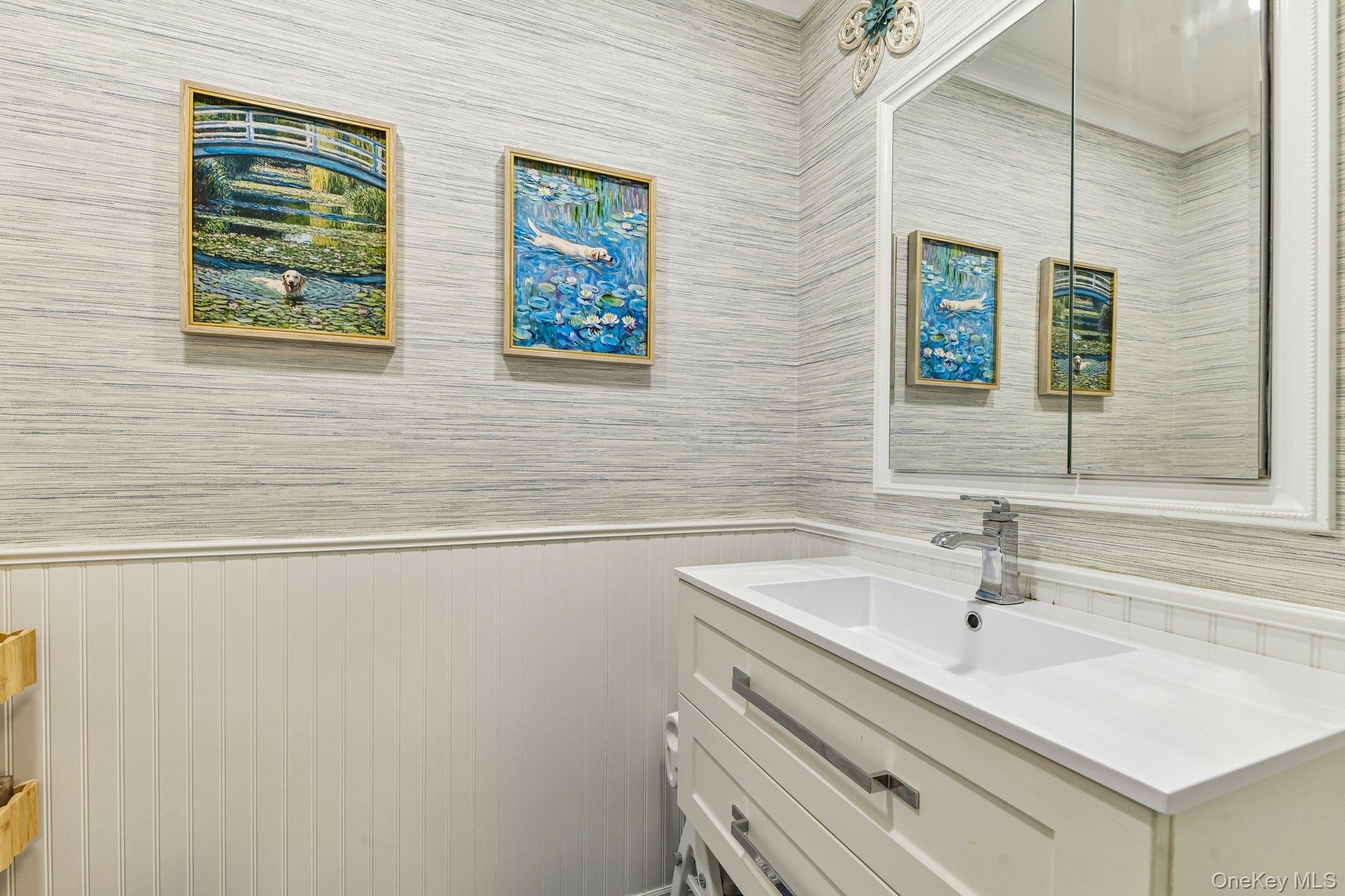 Half Bathroom off entry foyer.