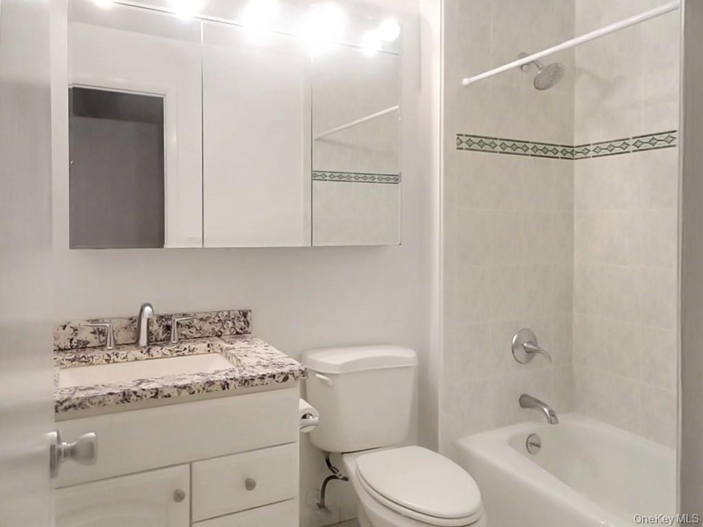 Bath located across from the second bedroom