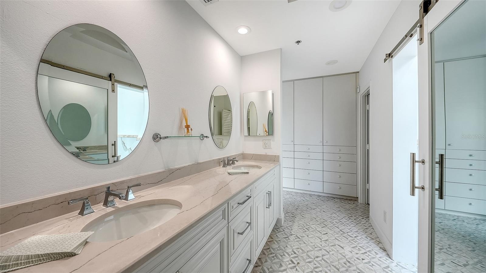 DUAL VANITIES & A SEPARATE LINEN CLOSET