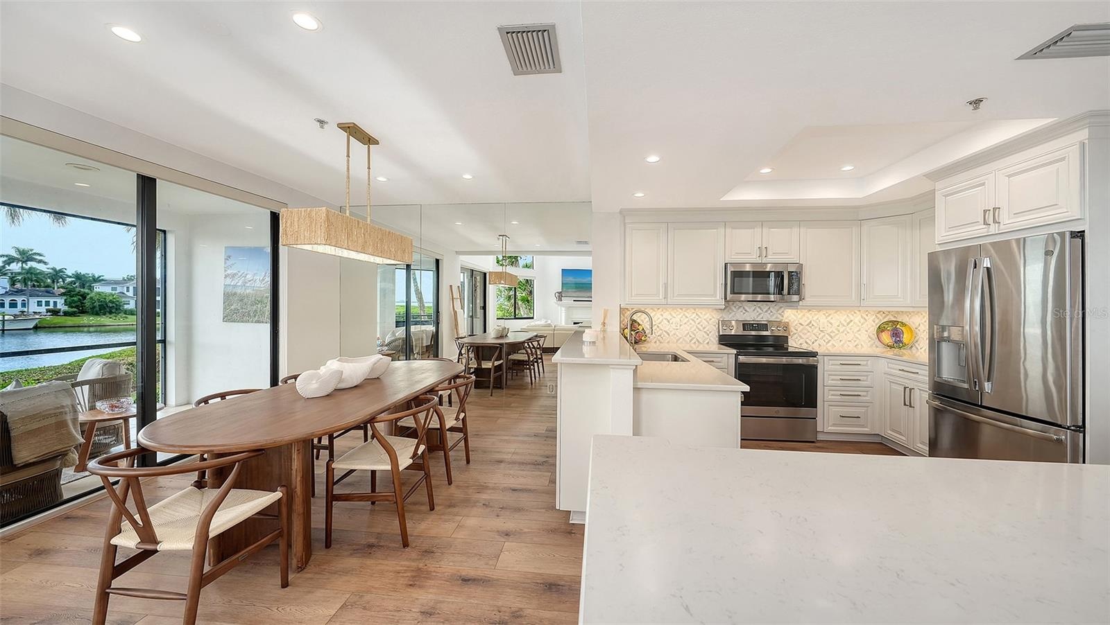 THE SERVING ISLAND HAS GREAT CABINETRY STORAGE