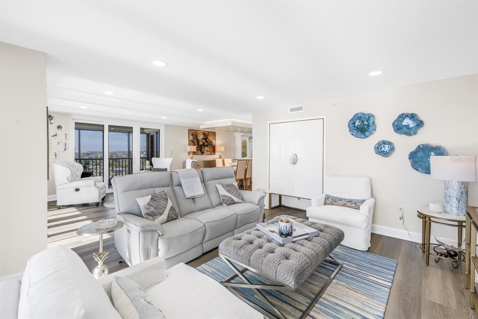 Family Room Features Custom Mother of Pearl Bar Cabinet