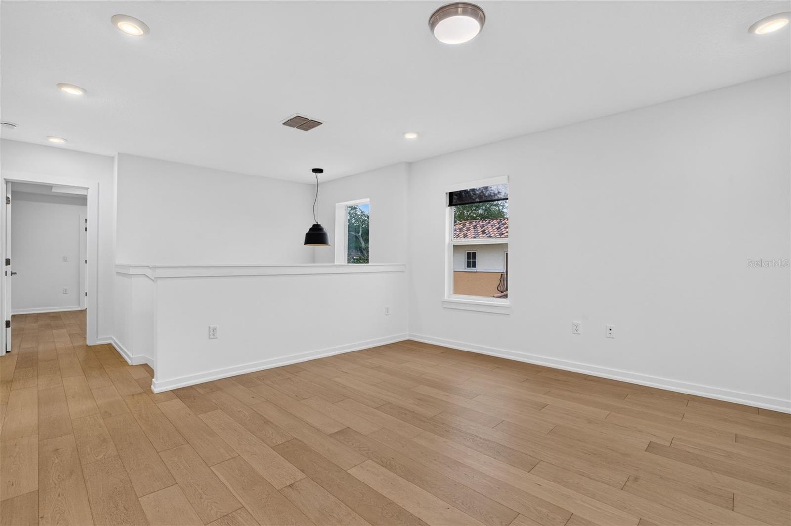 Stairwell and Hall that lead to Master Suite.
