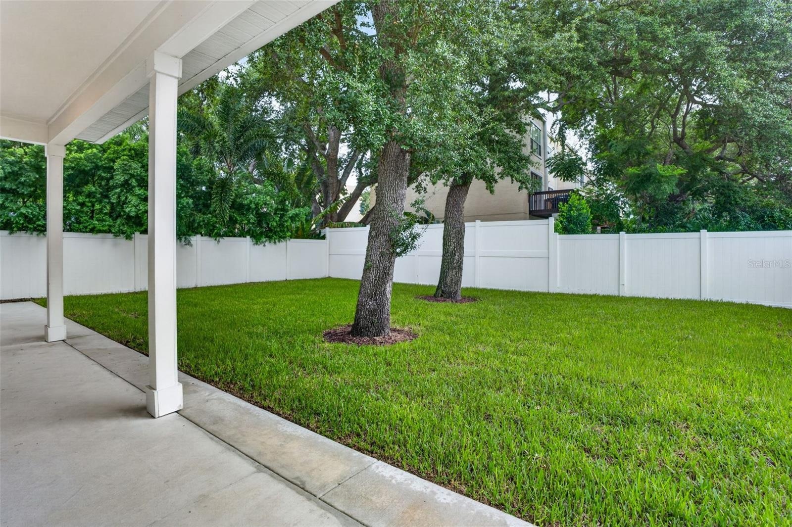 Backyard Covered Patio.Completely Fenced.