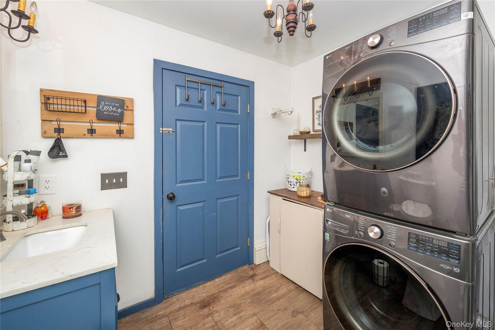 Newer full sized stacked washer and dryer.