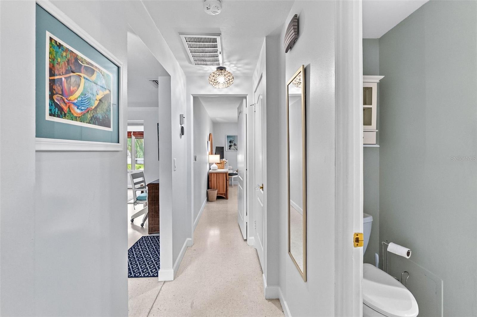 Hallway connecting the bedrooms and guest bathroom.