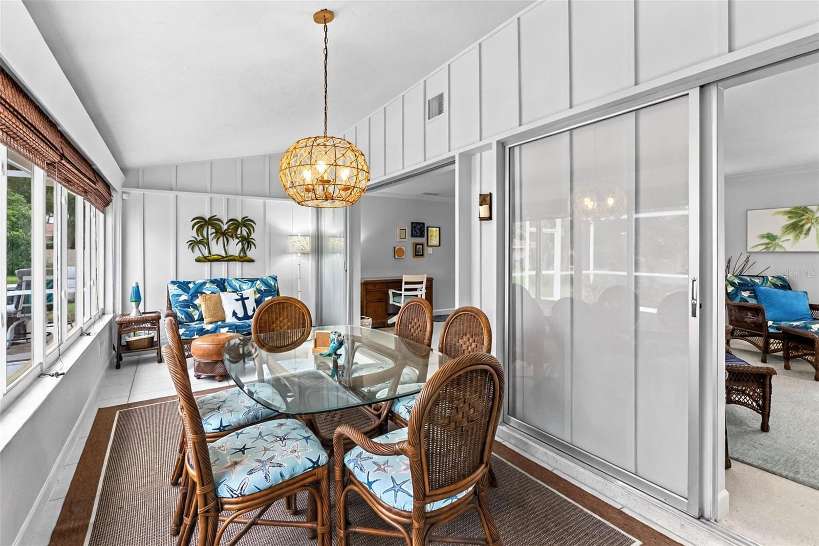 Florida room dining area and additional seating.