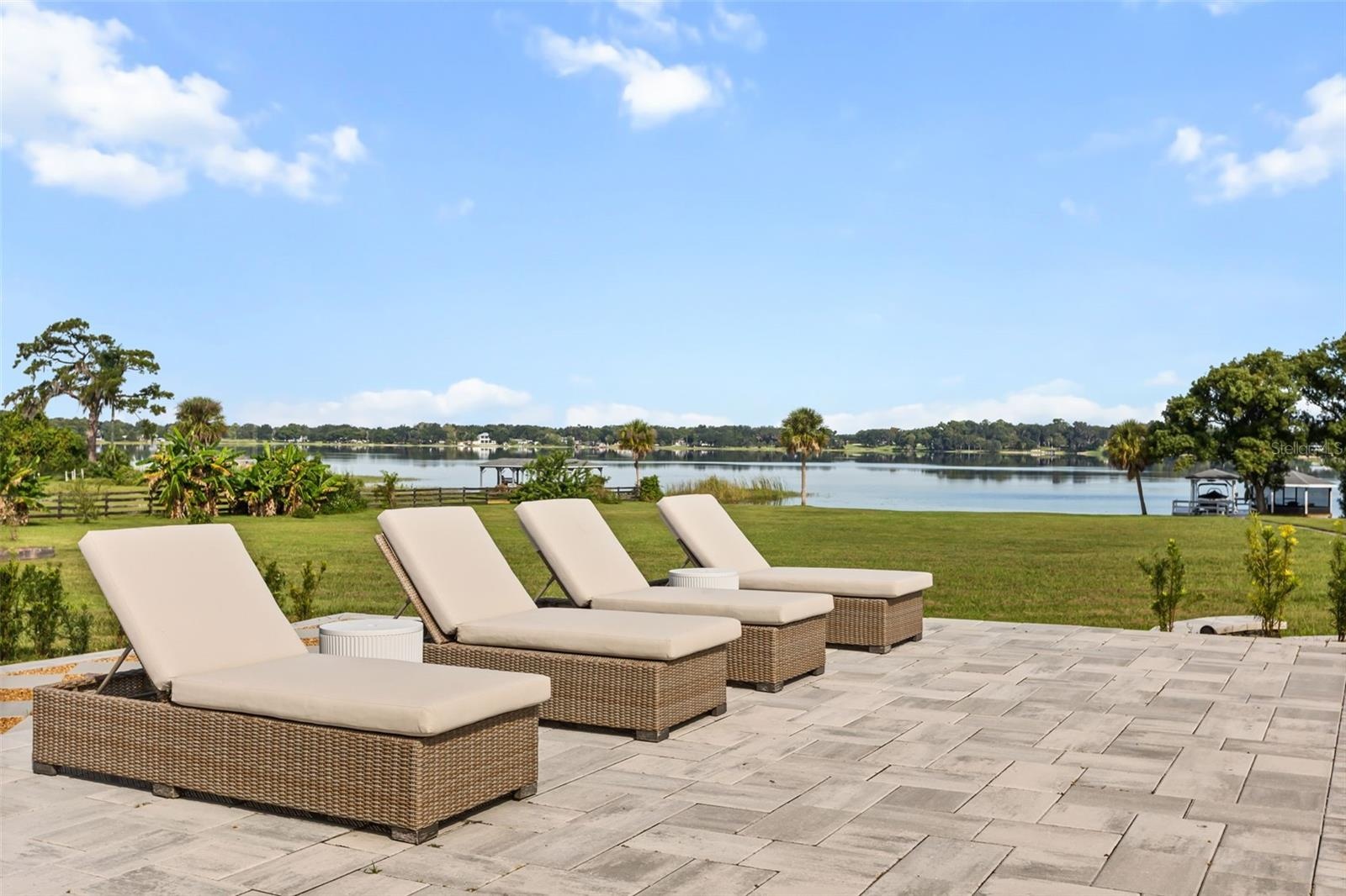 Lounging by pool with Lake Ola in view