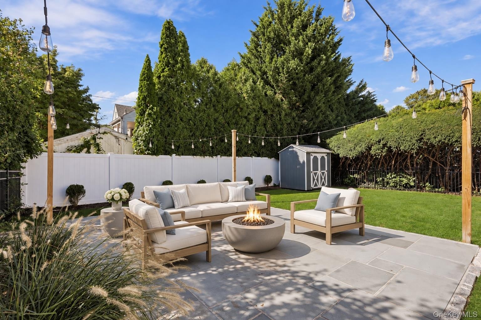 Patio furniture is virtually staged.