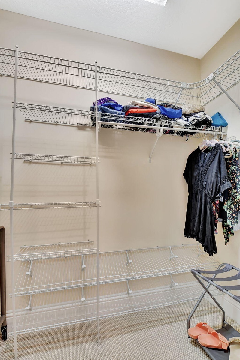 Walk in closet in primary bedroom