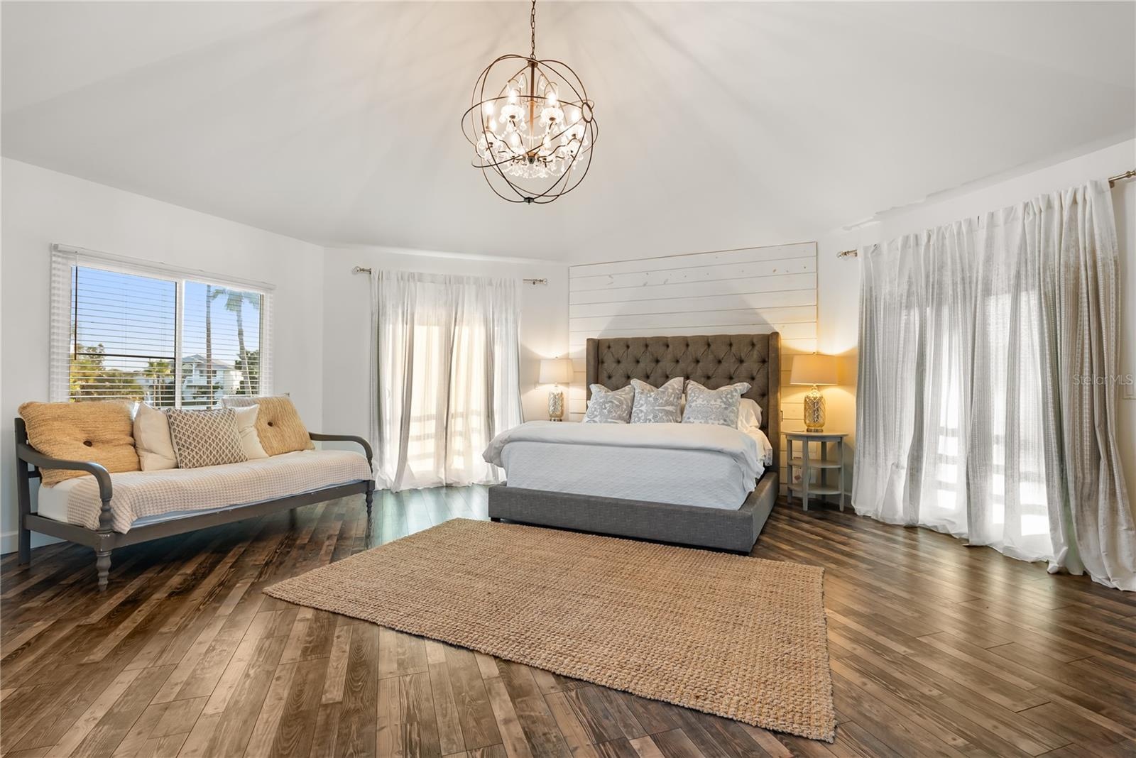 Primary suite: Spacious coastal retreat with ocean views, two large walk-in closets, and access to an oversized composite terrace overlooking the Atla