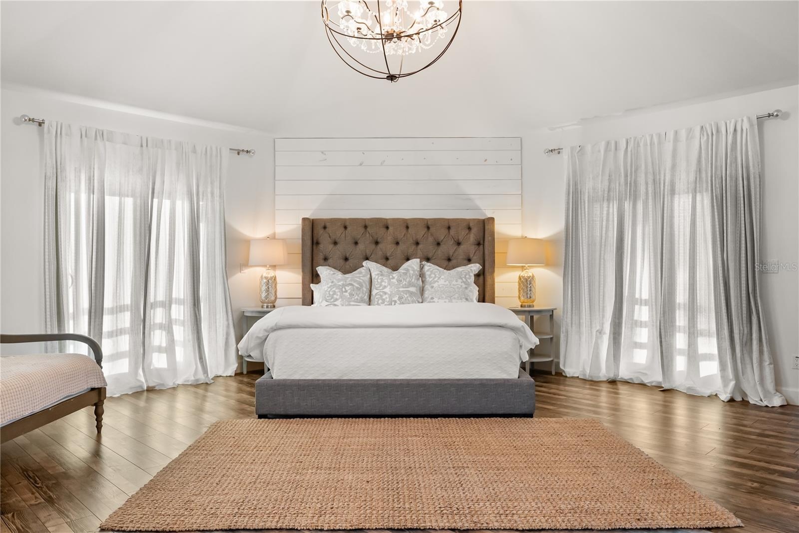 Primary suite: Spacious coastal retreat with ocean views, two large walk-in closets, and access to an oversized composite terrace overlooking the Atla