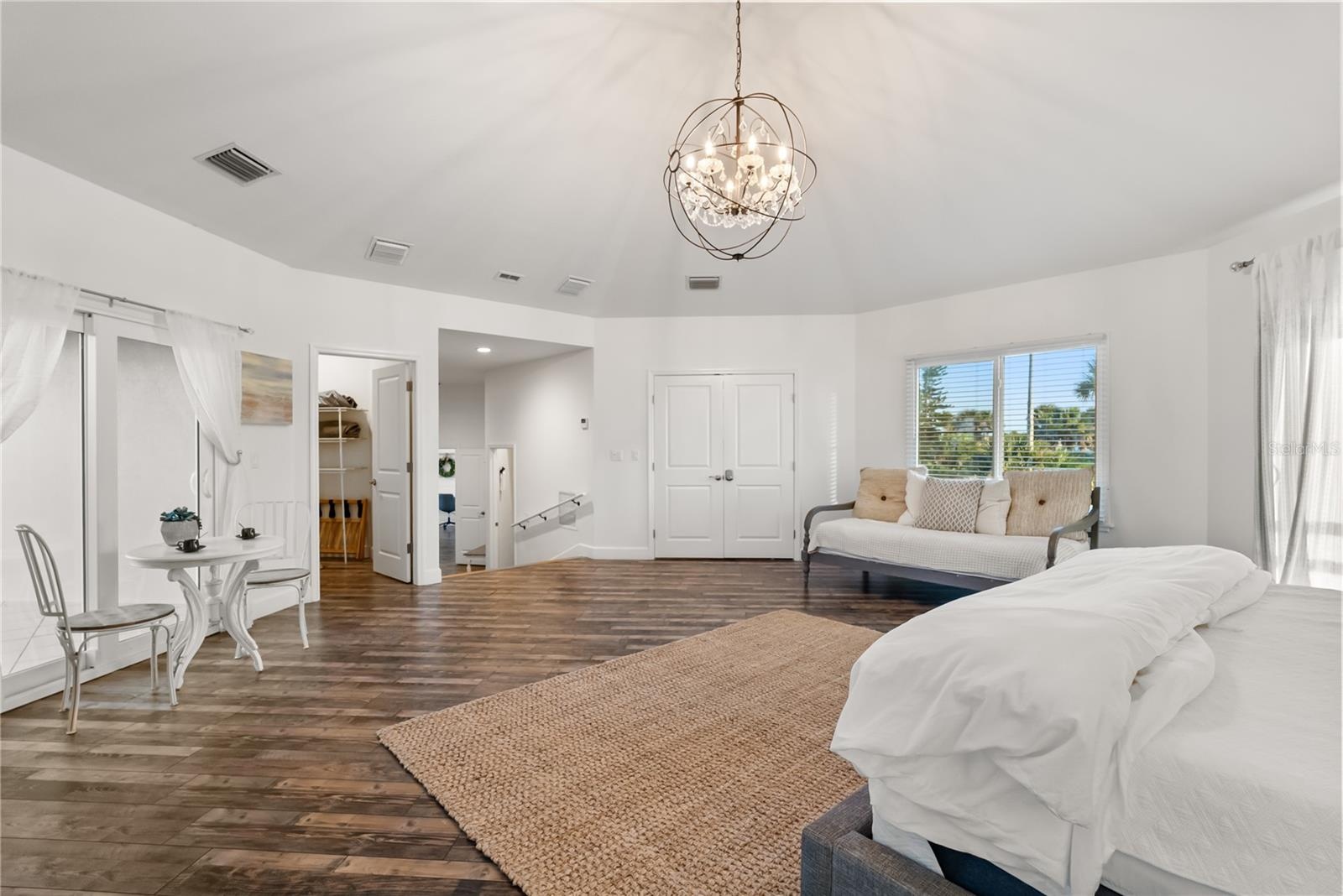 Primary suite: Spacious coastal retreat with ocean views, two large walk-in closets, and access to an oversized composite terrace overlooking the Atla