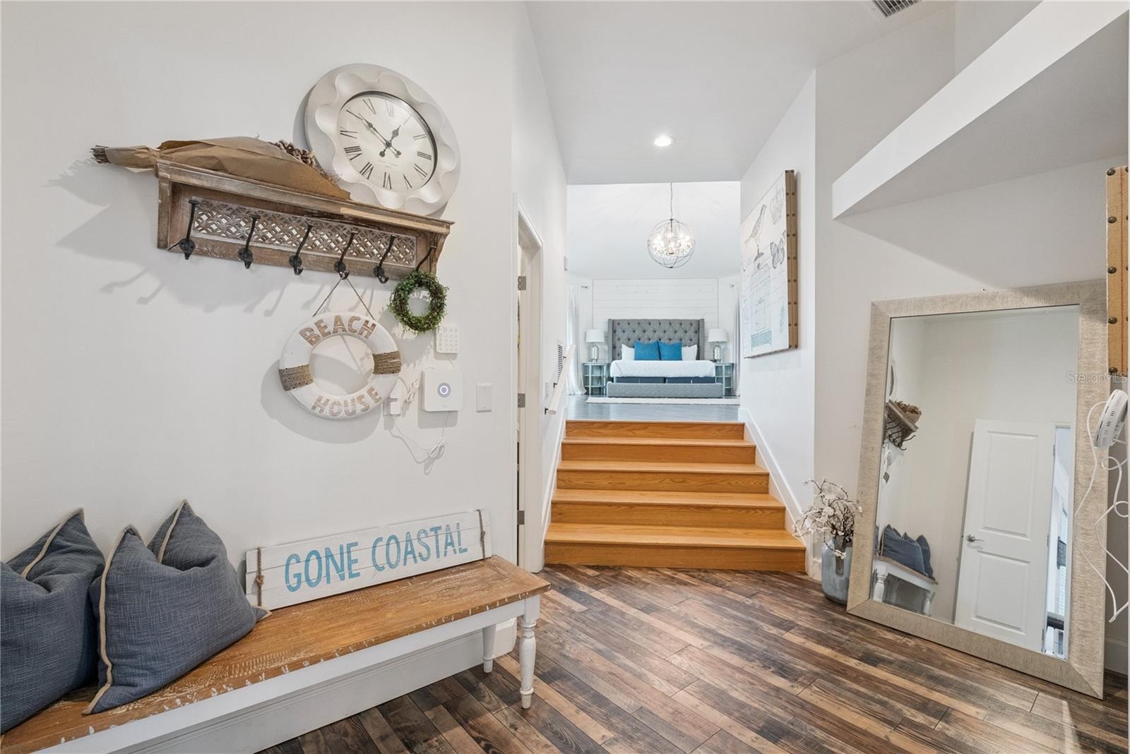 Foyer leads to master suite, ensuite bathroom and laundry in this area