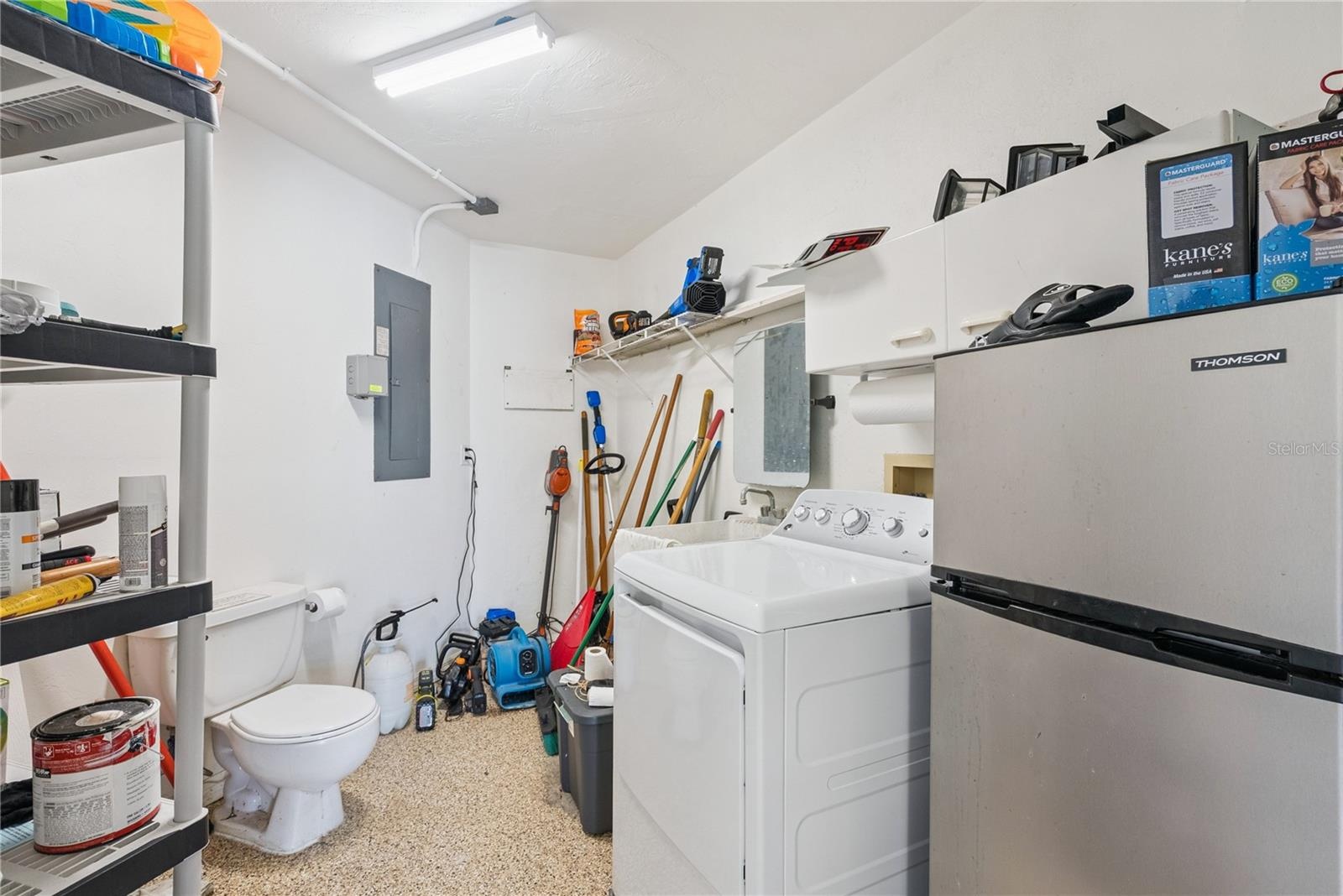 Garage: Attached garage with an extra dryer and plentiful pool and beach toys