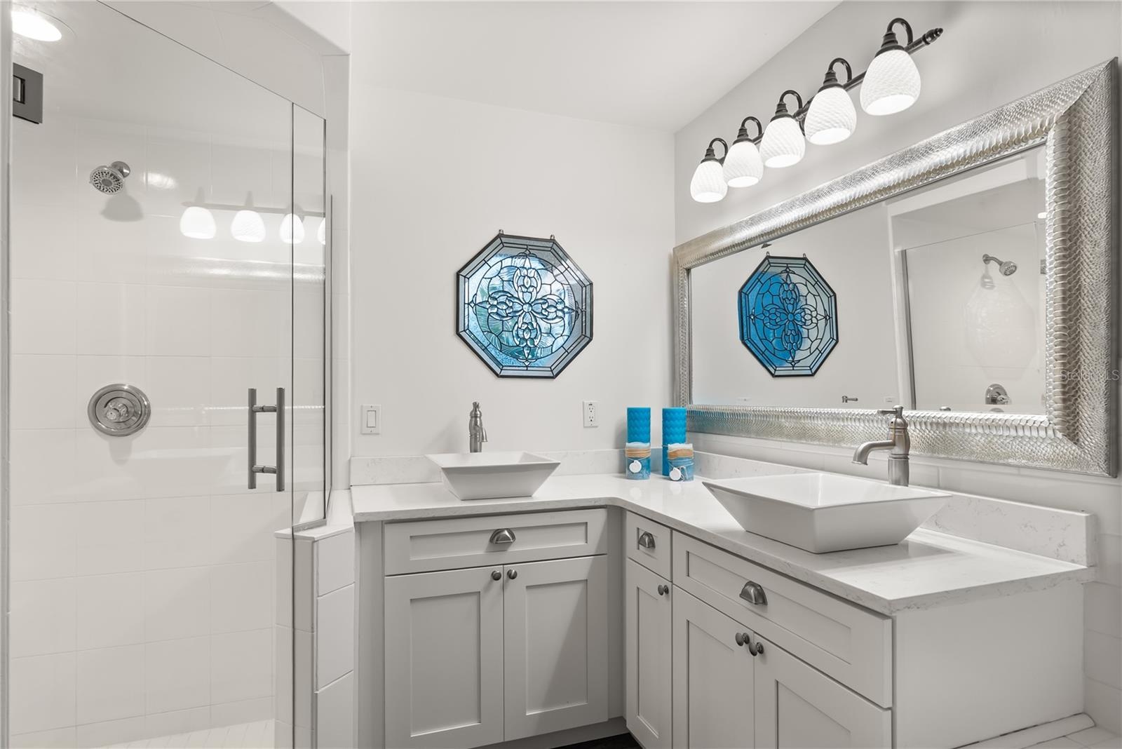 Master ensuite bathroom with updated finishes and statement window and skylight