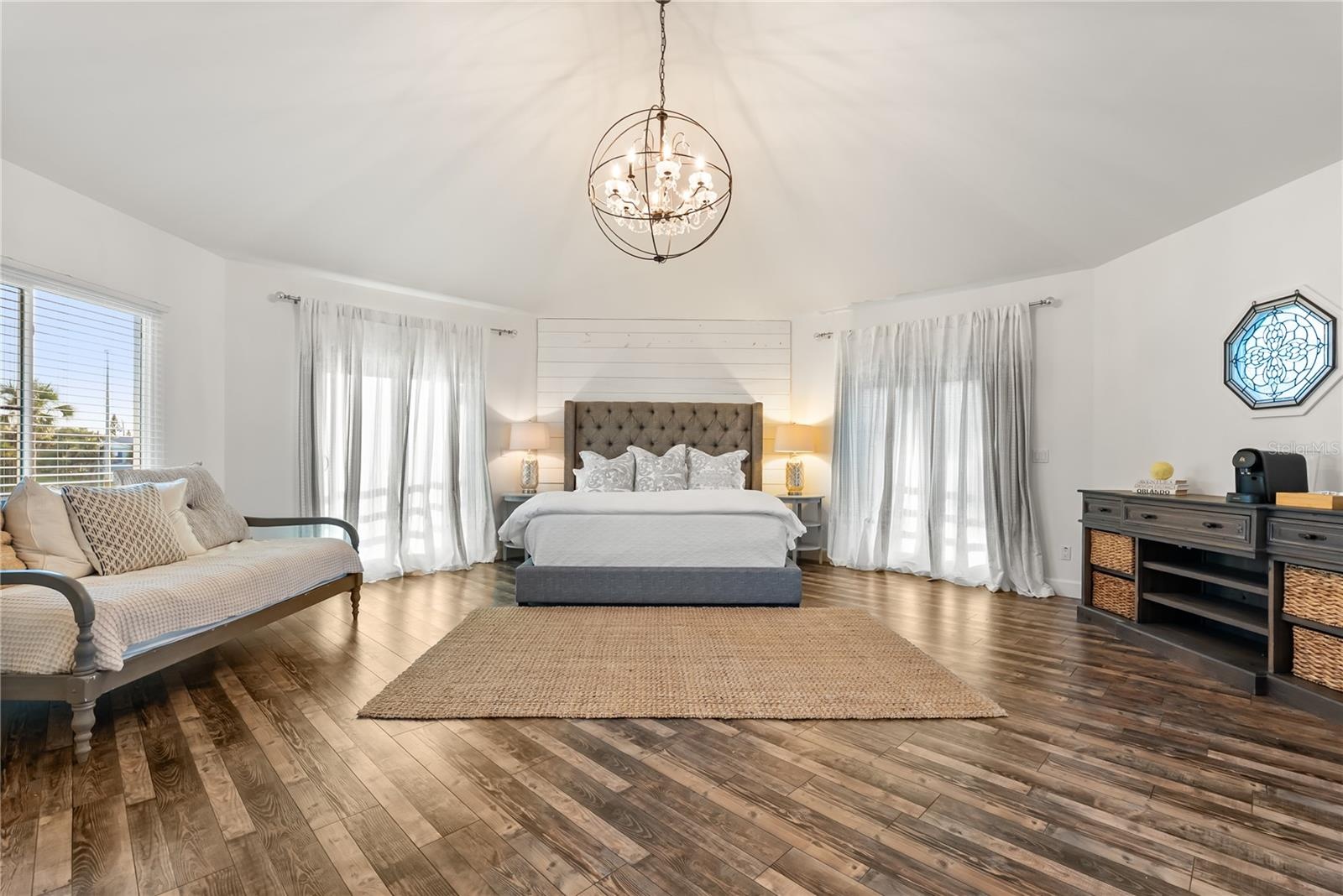 Primary suite: Spacious coastal retreat with ocean views, two large walk-in closets, and access to an oversized composite terrace overlooking the Atla