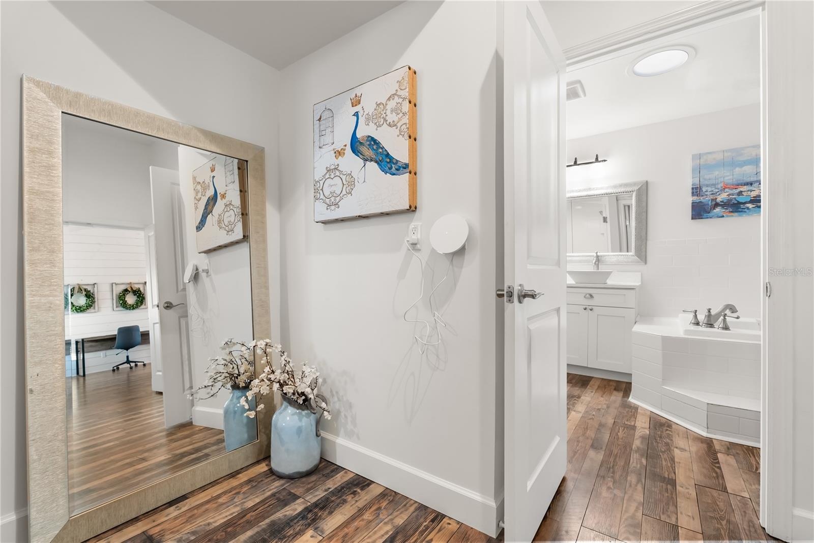 Master suite entrance with access to laundry room, ensuite bathroom and walk in closet