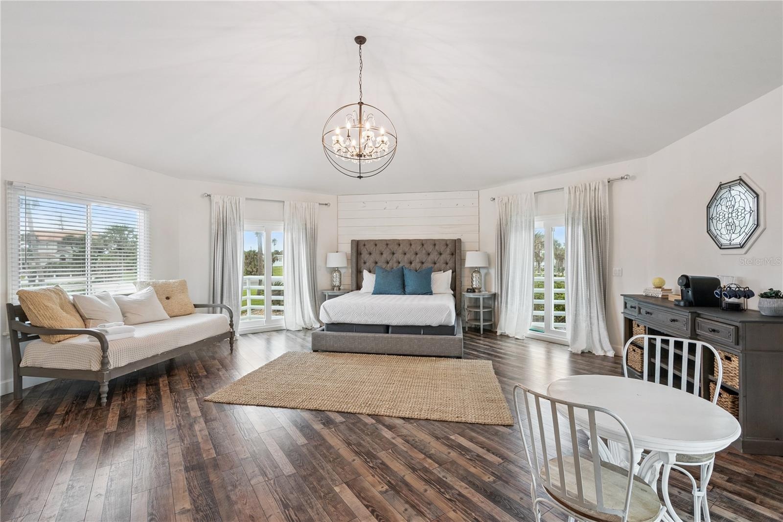 Primary suite: Spacious coastal retreat with ocean views, two large walk-in closets, and access to an oversized composite terrace overlooking the Atla