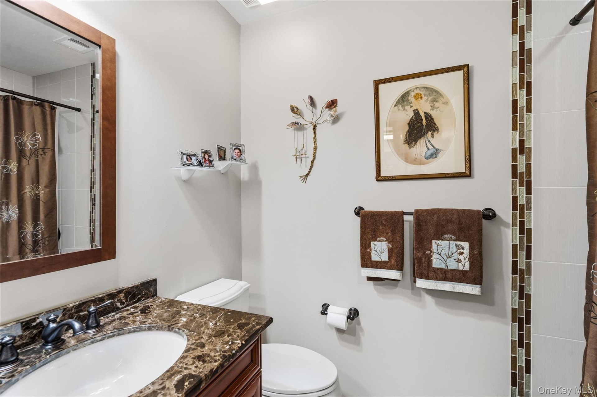 Recently Updated Center Hall Bathroom With Tub/Shower, Custom Wood Granite Topped Vanity & Porcelain Tile Floors!