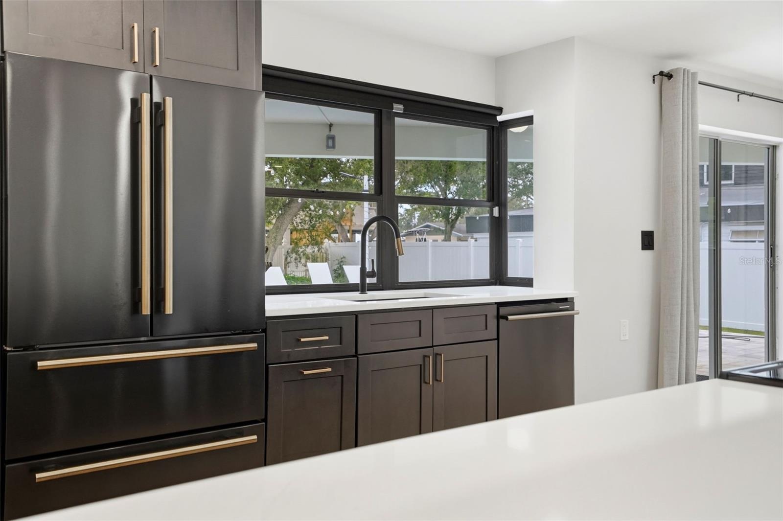 Beautiful view of Pool from Kitchen Sink & Pass-through Window