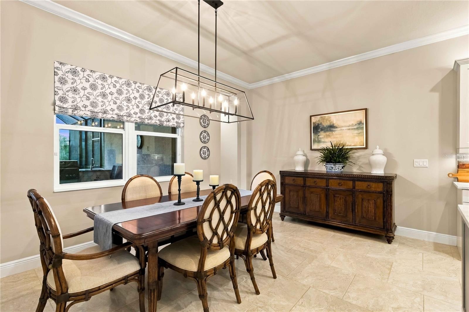 Spacious dining room tucked just off the main living area
