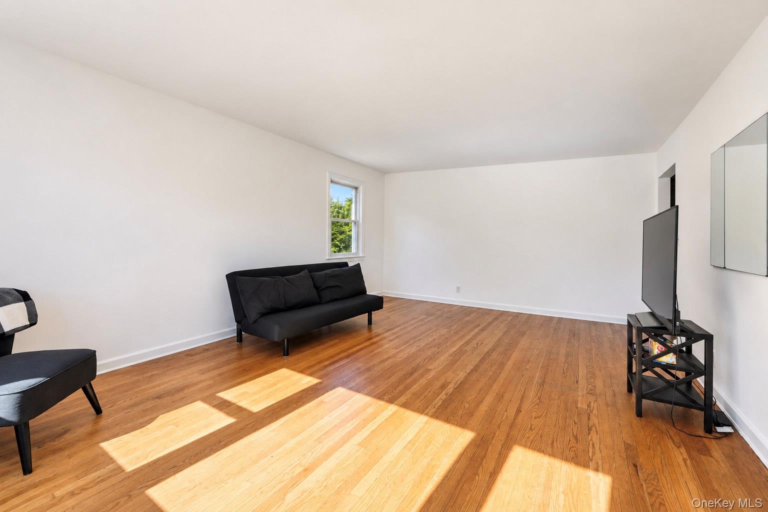 Living room with dining area other view