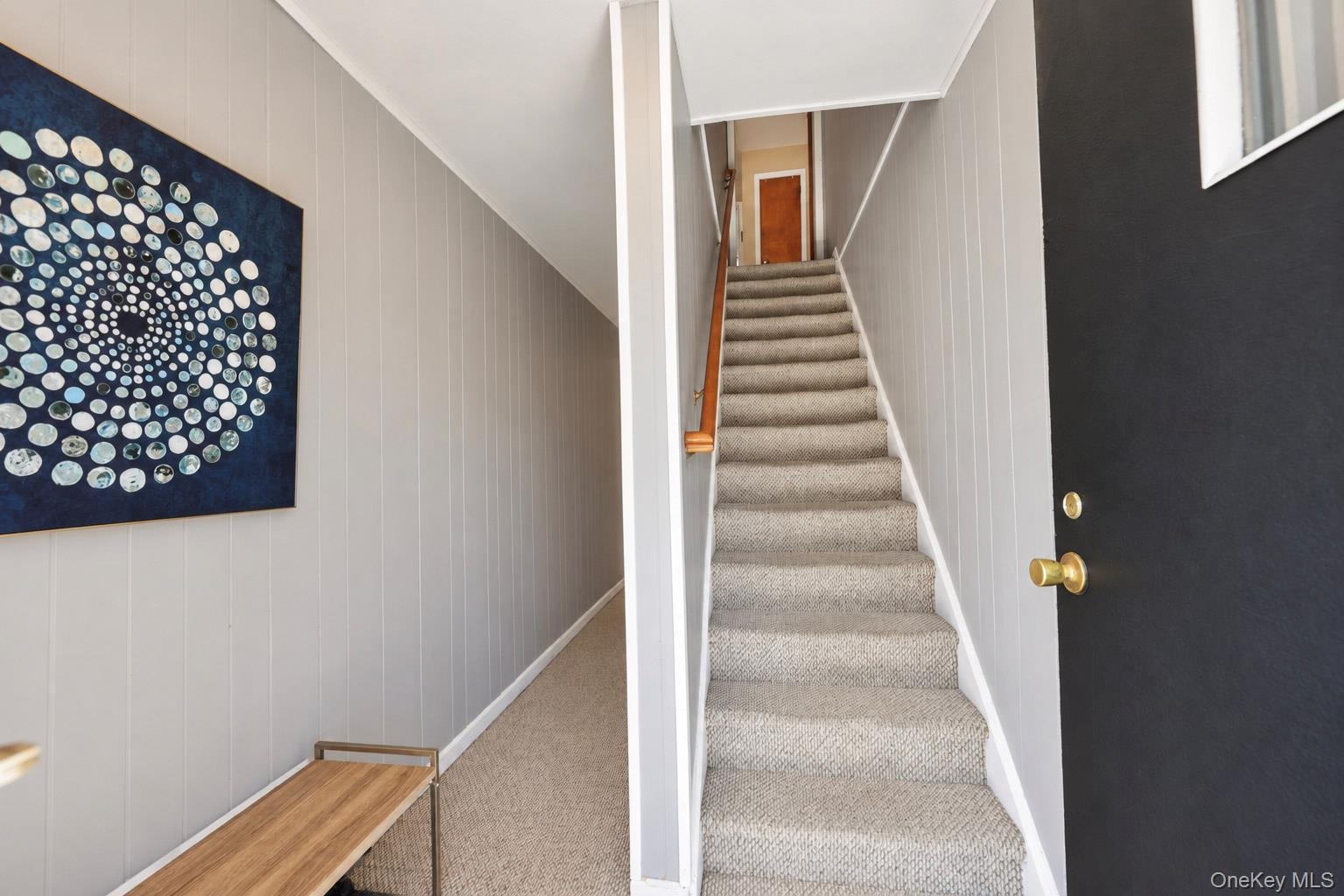 Entrance foyer - upstairs to Second Floor Unit