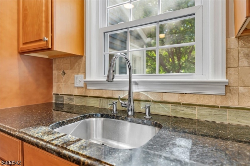 Kitchen Window looks to yard