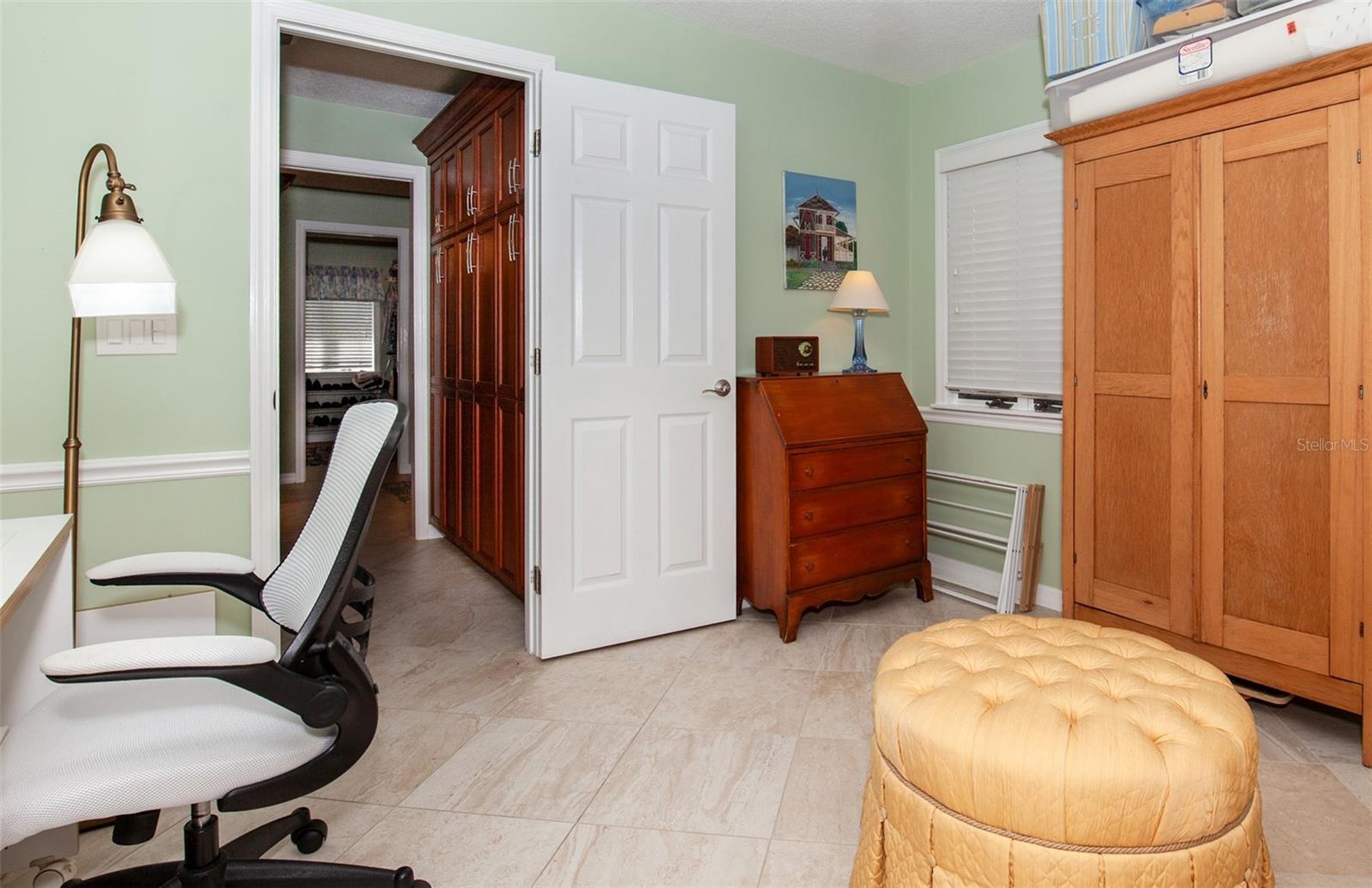 Possible office, den, art/craft room or personal fitness center