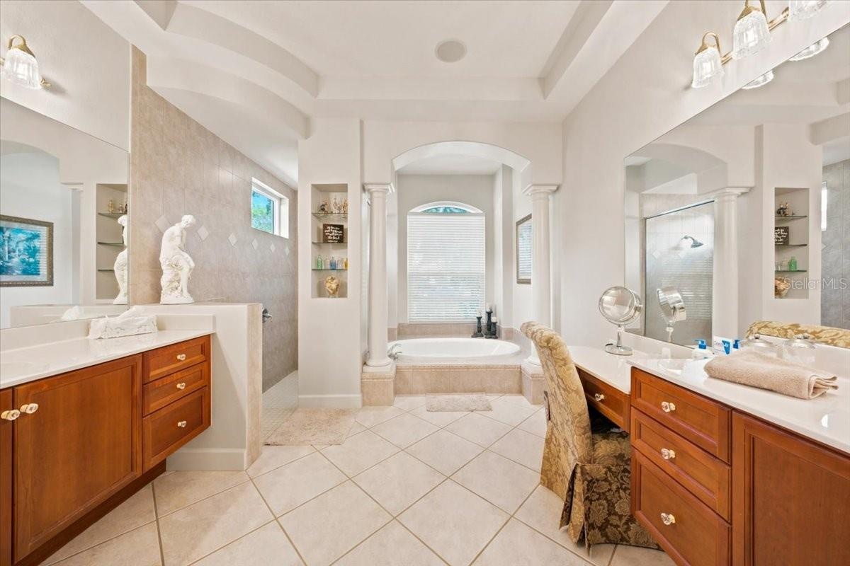 Individual vanity areas provide convenience and personal space.