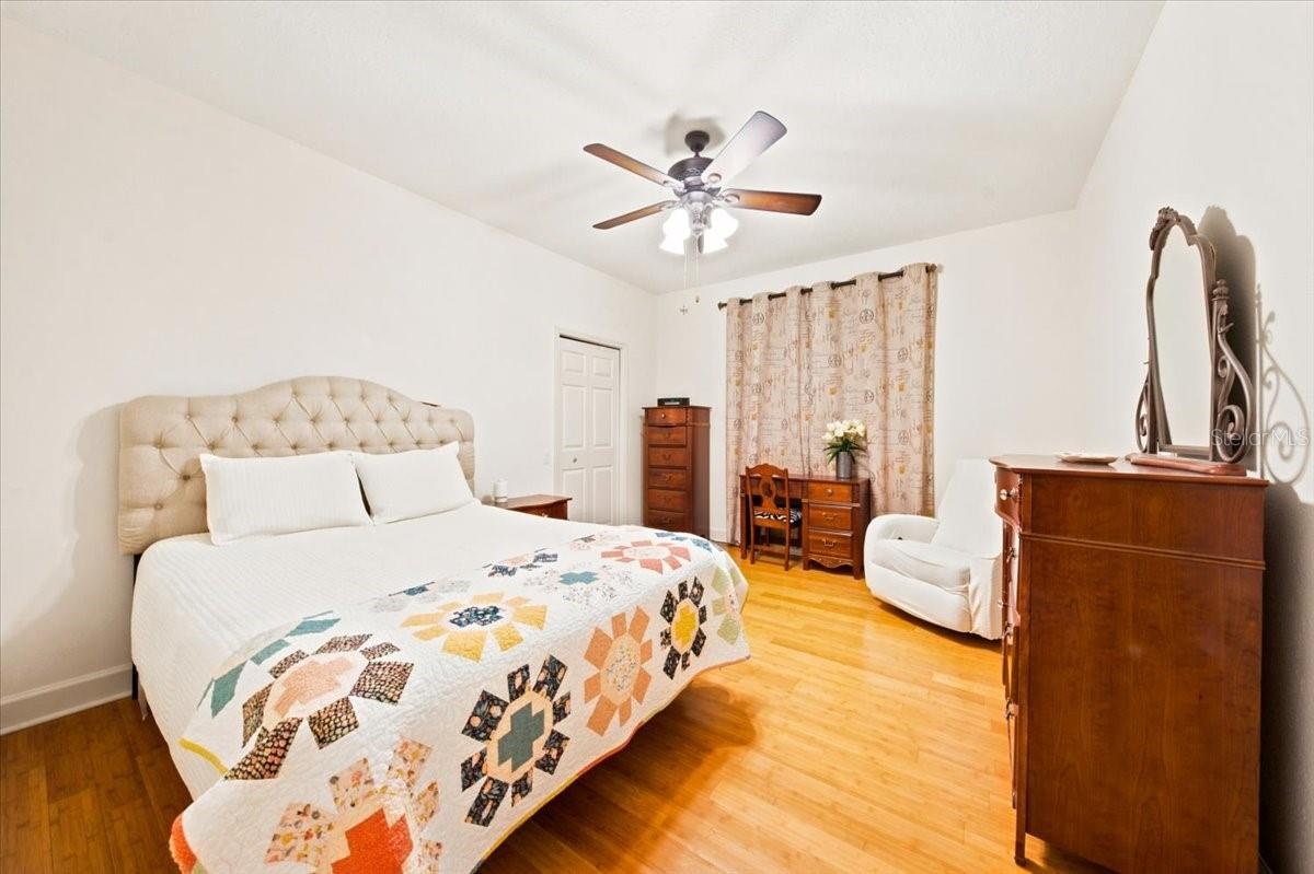 Additional bedroom is positioned toward the rear of the home.