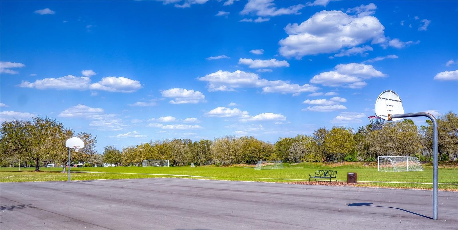 Community basketball facilities provide additional recreational options.